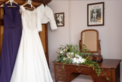 Louise Richey - Wedding dress hanging up