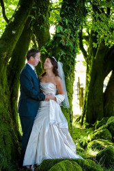 Maggie McCall - bride and groom outside