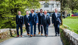Maggie McCall - groomsmen outside