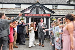 Richard Palmer - bride and groom confetti outside