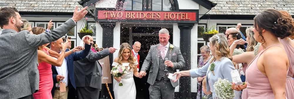 Richard Palmer - bride and groom confetti outside