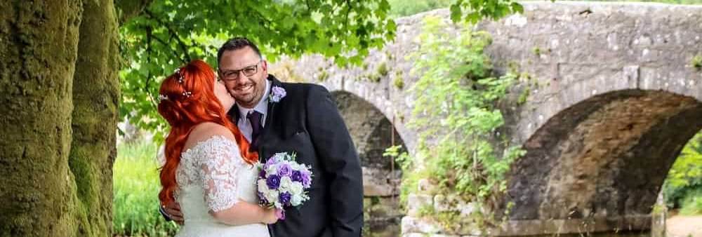 Lauren Spinks - bride and groom outside