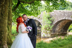 Lauren Spinks - bride and groom outside
