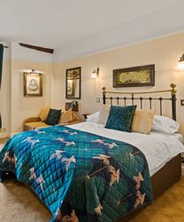 Bedroom at Two Bridges Hotel