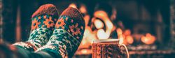 In front of the fire