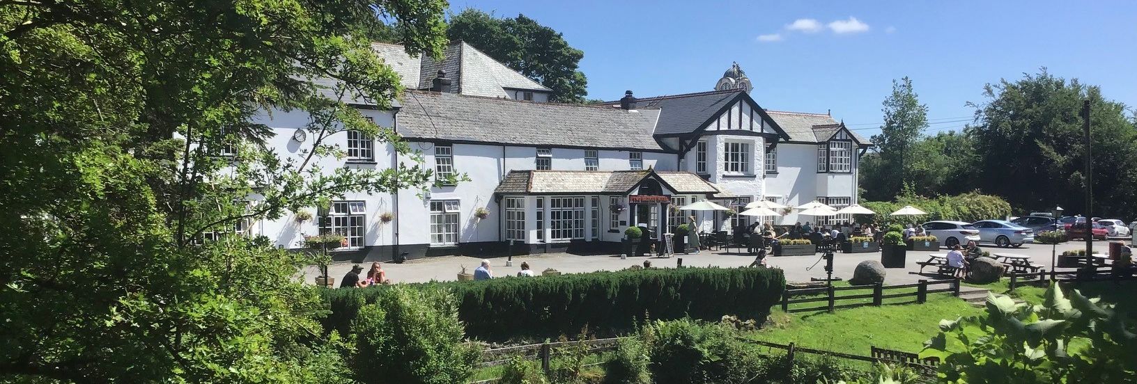 Summer view of Two Bridges Hotel
