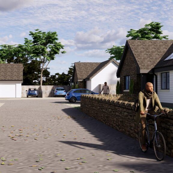 Residential street with stone houses, cyclists, pedestrians, and cars parked by modern cottages