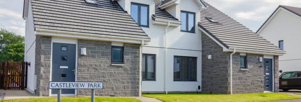 Modern semi-detached house with grey roof and exterior, located on Castleview Park.