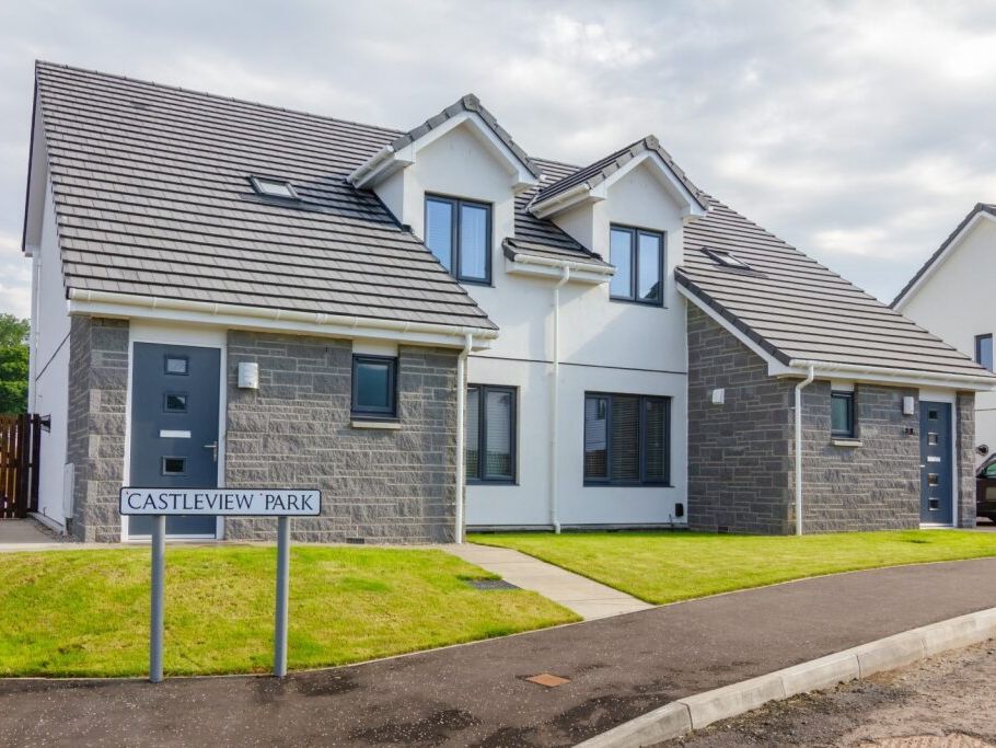 Modern semi-detached house with grey roof and exterior, located on Castleview Park.