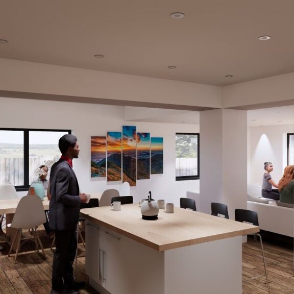 Modern open-plan kitchen and living area with people socializing.