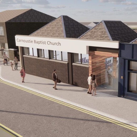 Carnoustie Baptist Church building exterior with people on sidewalk