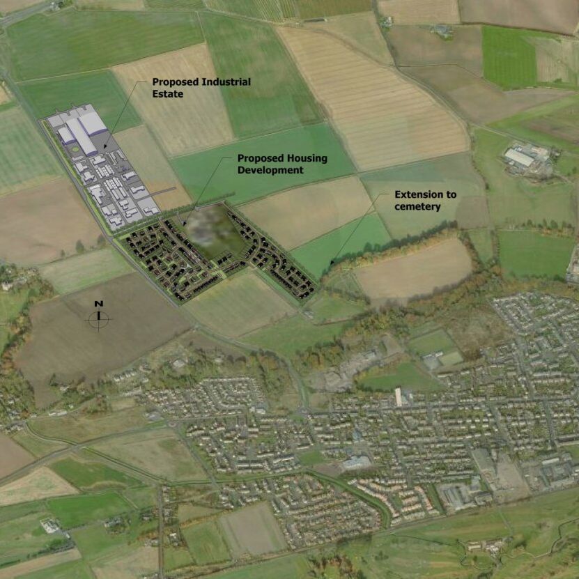 Aerial view of a rural area with labeled zones for a proposed industrial estate, housing development, and cemetery extension.