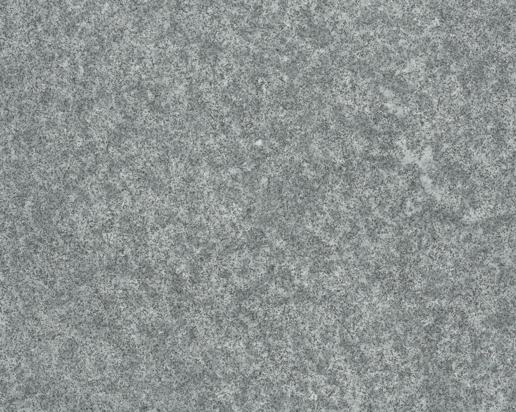 Close-up texture of gray granite stone surface