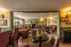 spacious restaurant with wood panelling