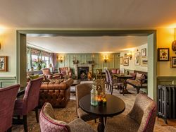 spacious restaurant with wood panelling