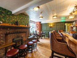 spacious restaurant with wood panelling