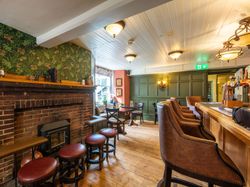 spacious restaurant with wood panelling
