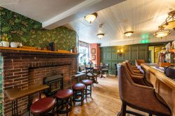 spacious restaurant with wood panelling