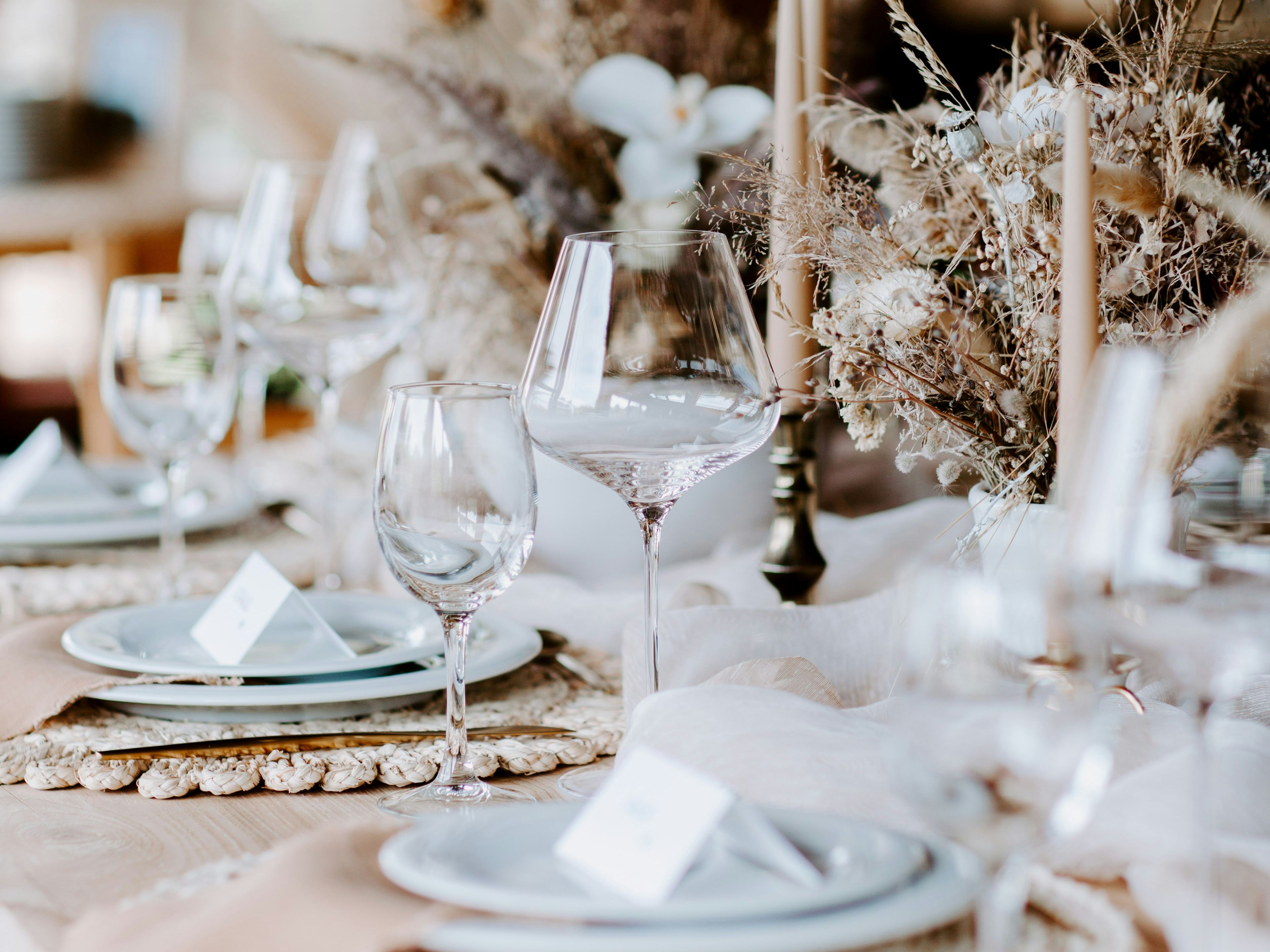 wedding table, with crockery, glasses and candles