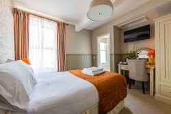 cosy double bedroom with flat screen tv
