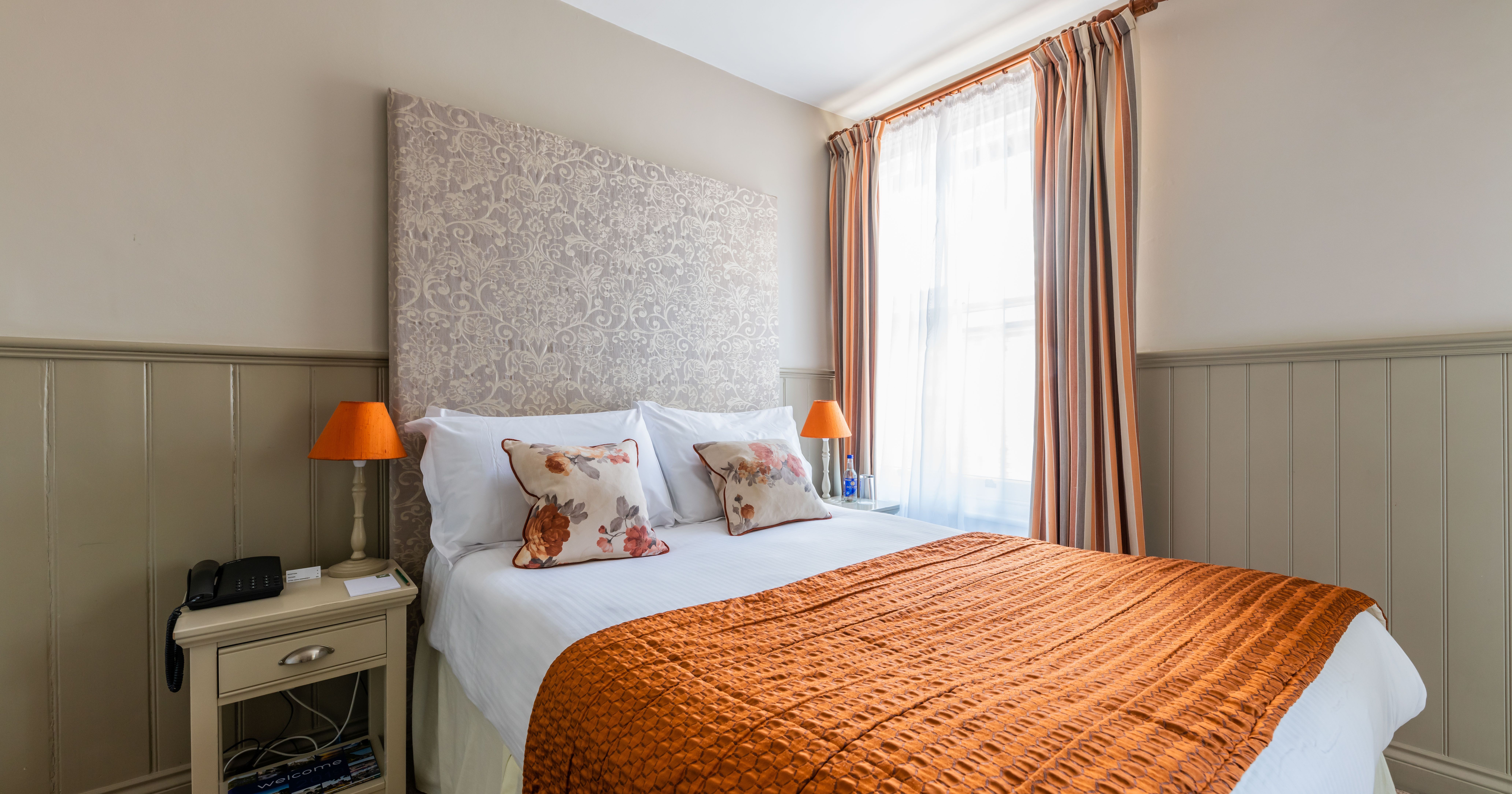 cosy double bedroom with flat screen tv