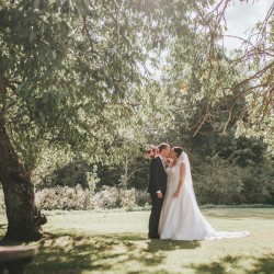 Bride and groom in gardens