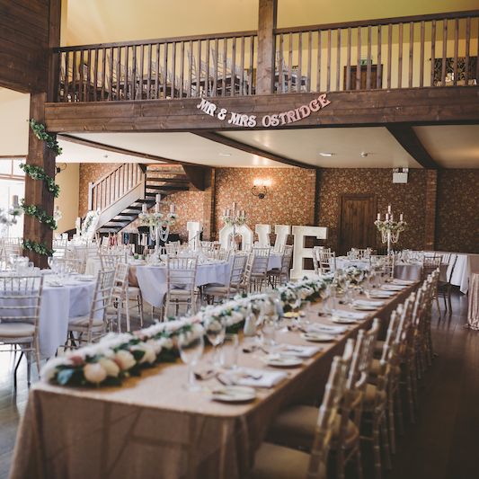 View of a garden gazebo through a window with grid pattern.