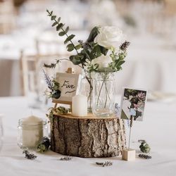 Old brick wall partially covered with green ivy