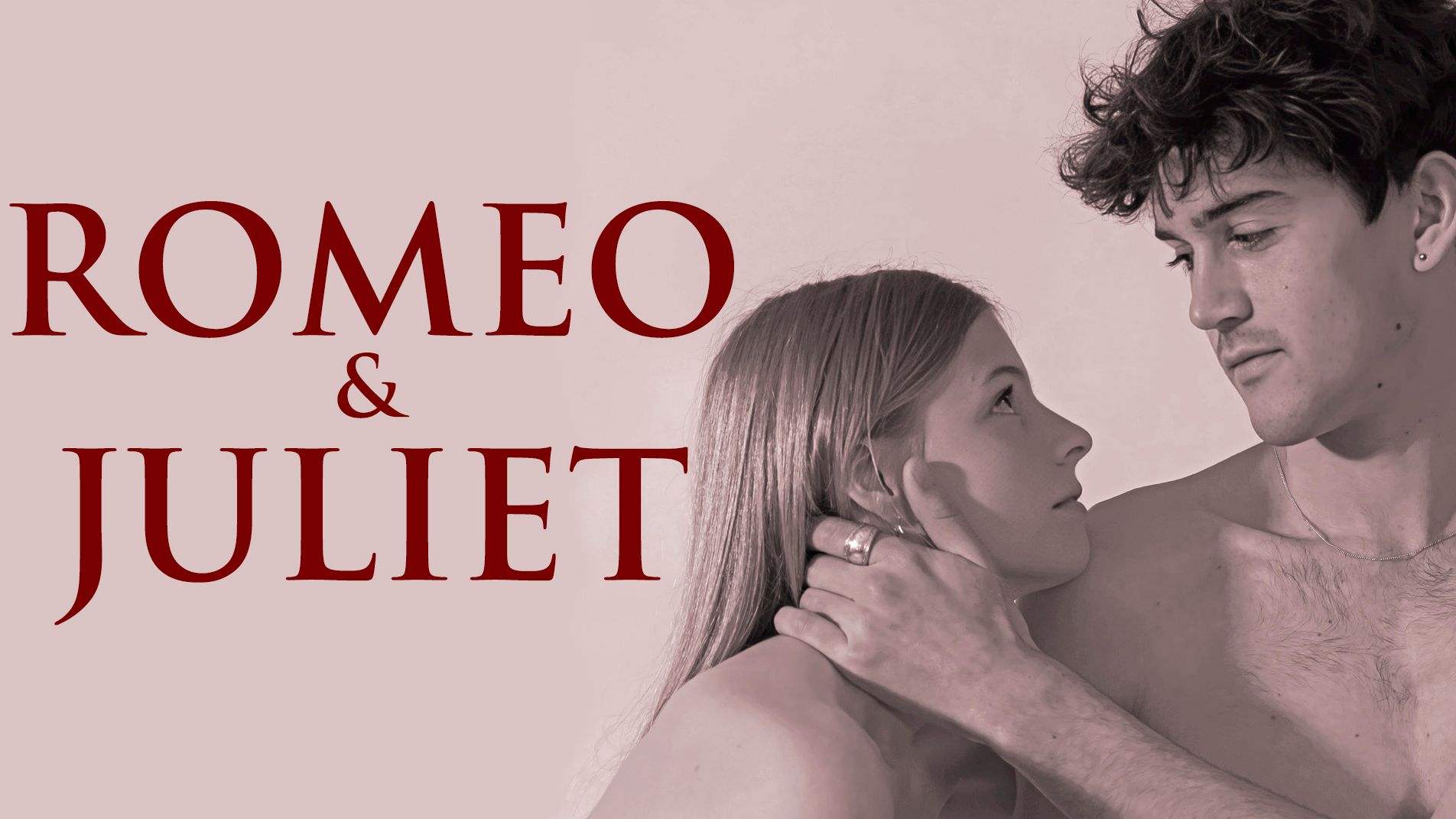 Romeo and Juliet text with a man and woman gazing at each other intimately