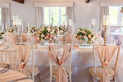 White & baby pink wedding table set up decorations