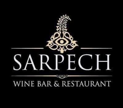 Sarpech Wine Bar & Restaurant logo with decorative graphic