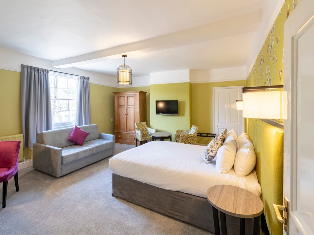 Large Double room with sofa and coffee tabe