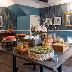 Cereals, fruit juices and fresh fruit served at breakfast