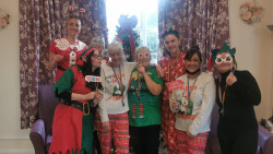Staff dressed up at Christmas