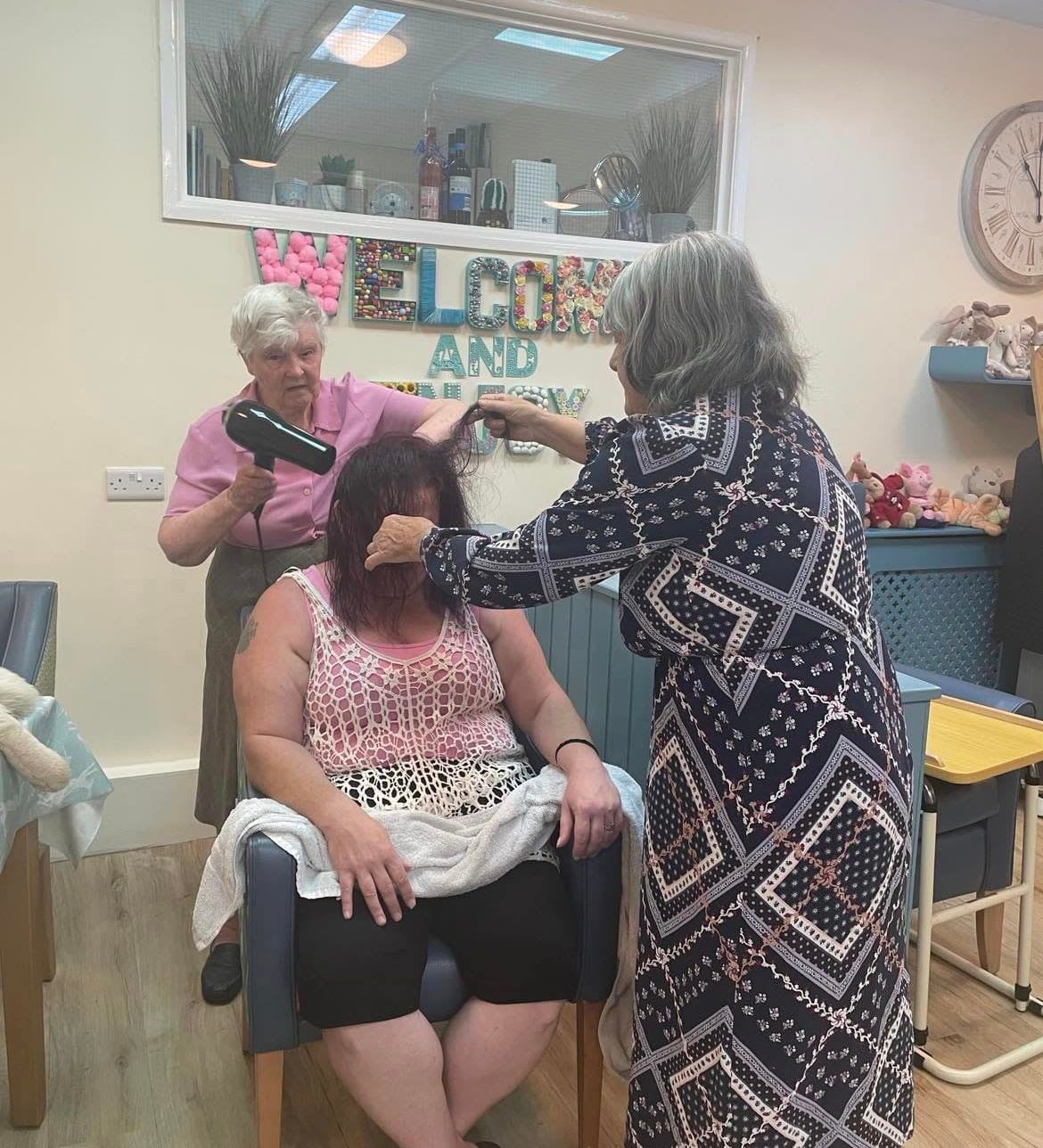Residents doing hairdressing