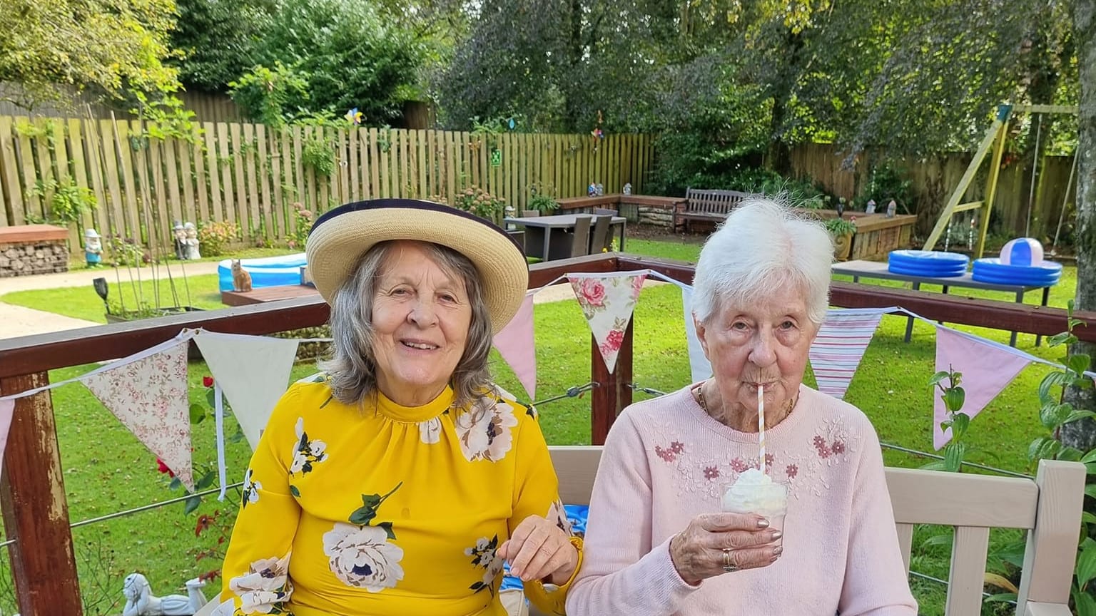 Ladies sipping milkshakes