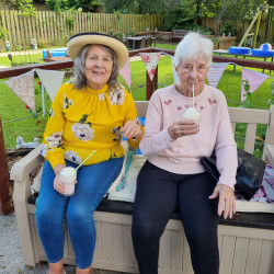Ladies sipping milkshakes