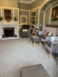 Care home main lounge with comfy chairs