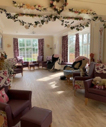Care home lounge with activities