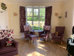 Care home lounge with activities