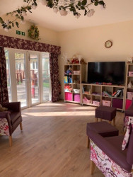 Care home lounge with activities