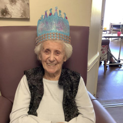 Lady wearing a paper crown