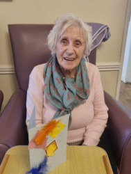 Lady with a card she made