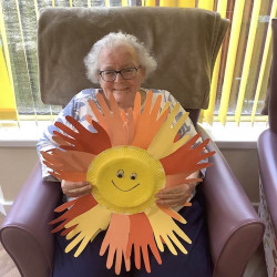 Lady with a craft she made