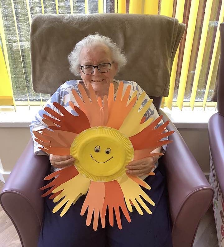 Lady with a craft she made