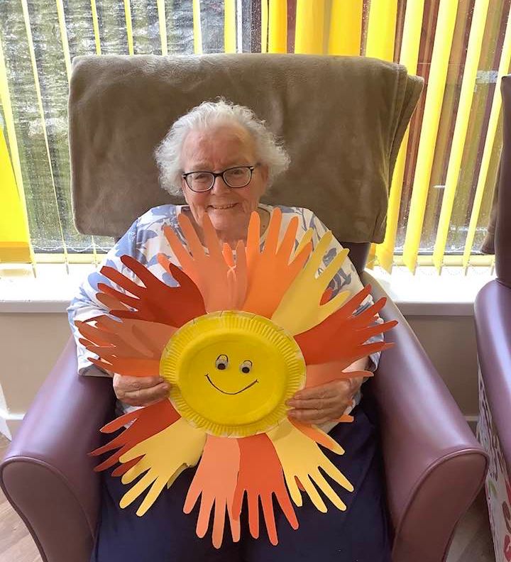 Lady with a craft she made