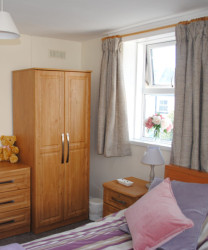 Light bedroom with wardrobe