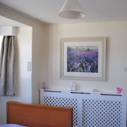 Bedroom with radiator cover