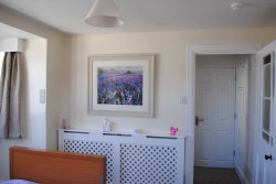 Bedroom with radiator cover