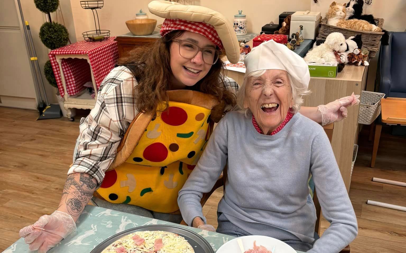 Enjoying making pizzas